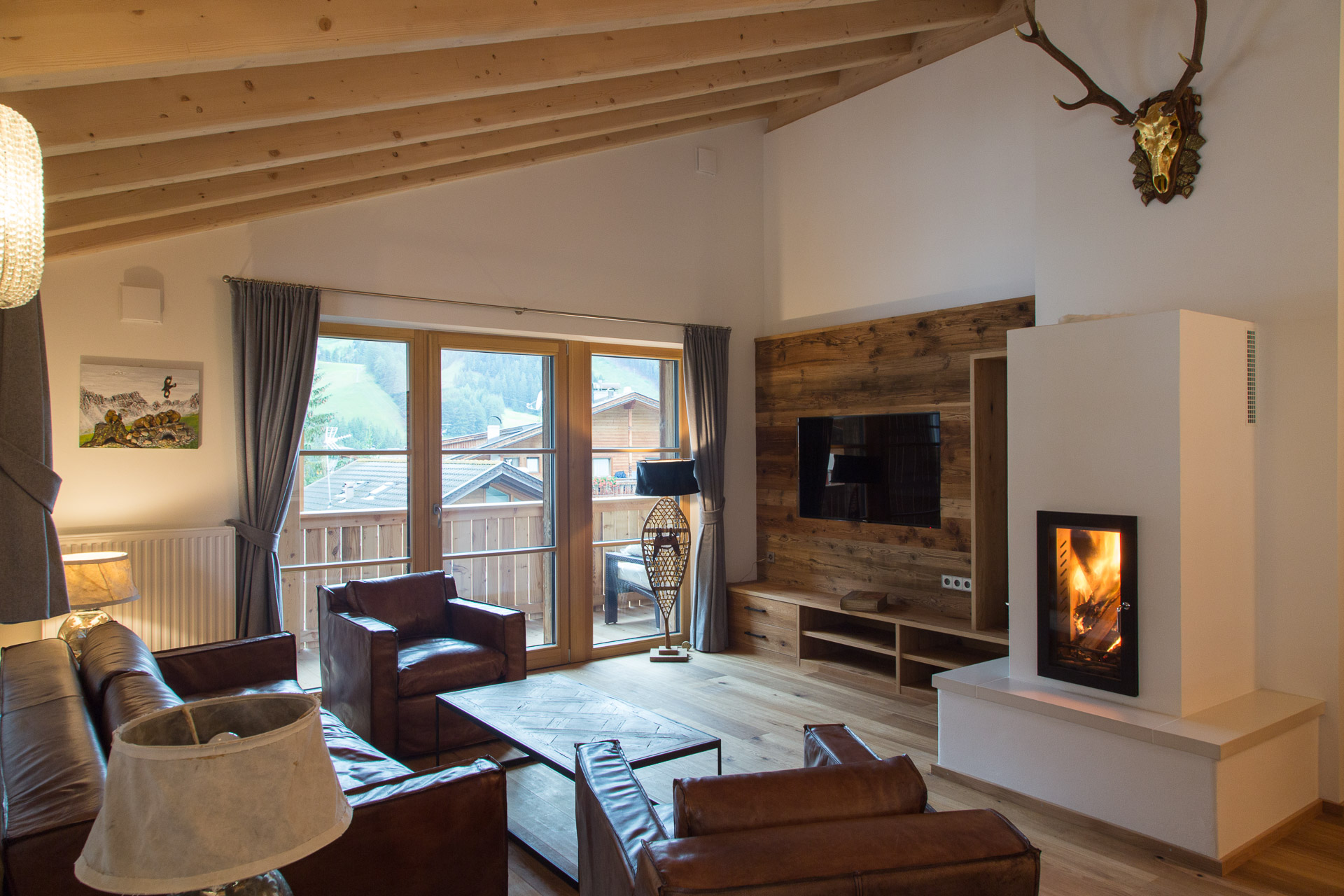 Hotelfotografie: Wohnbereich der Ferienwohnung / des Chalets St. Vigilio